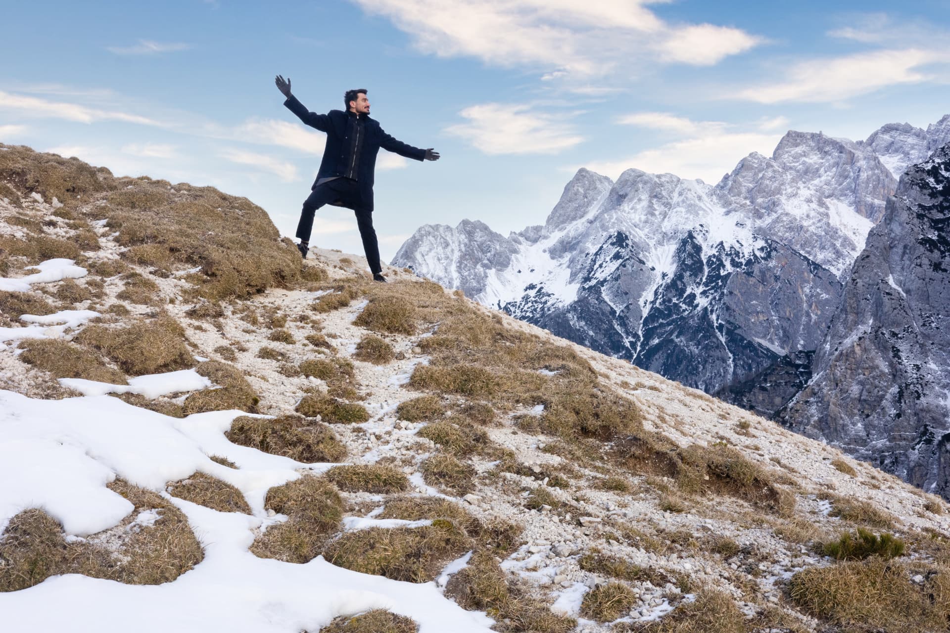 Khaled on a mountain trail overlooking the Julian Alps