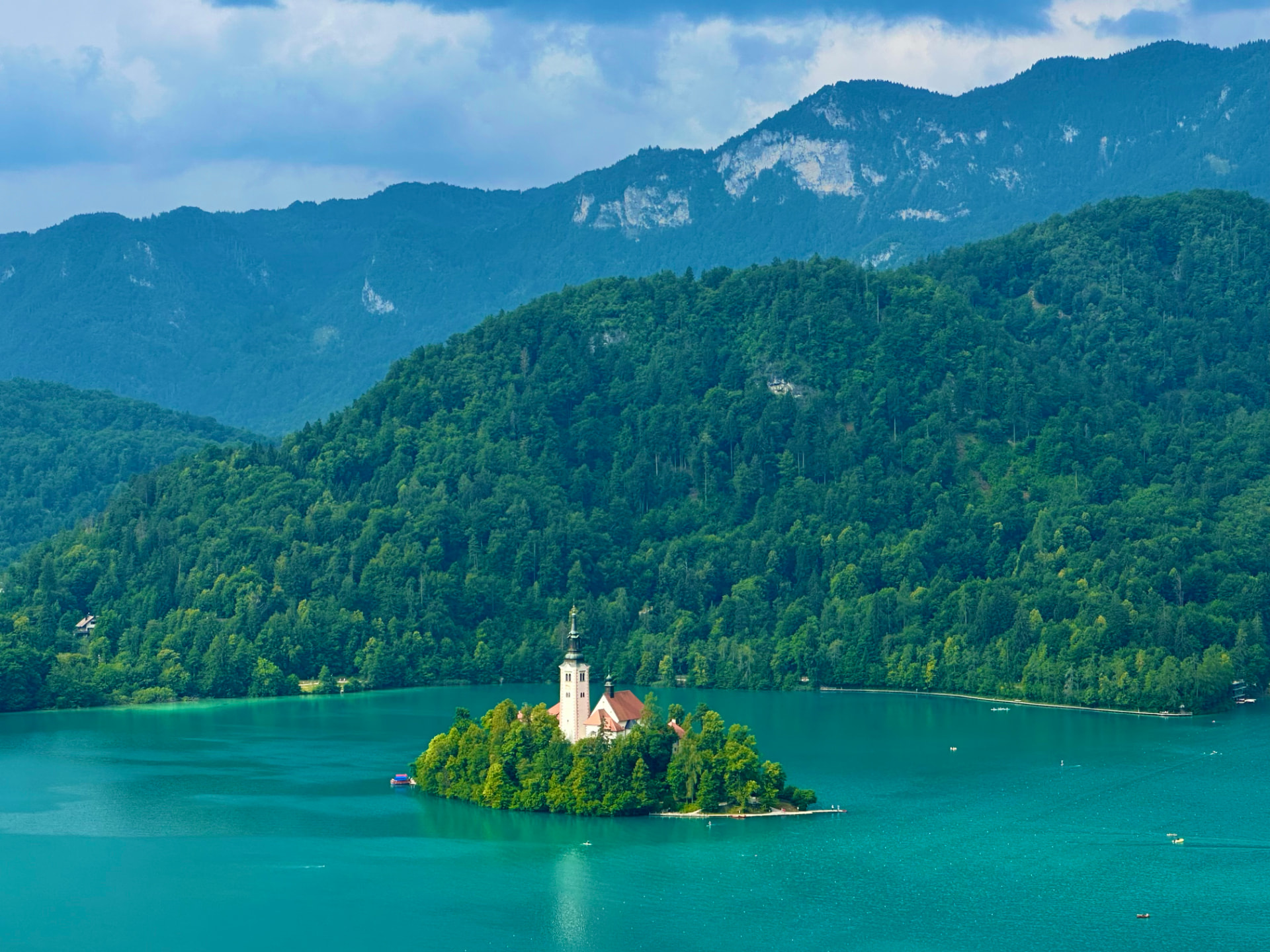 Lake Bled with the island church and the Julian Alps behind it