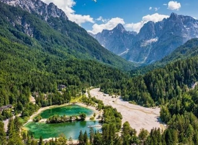 Alpine valley with mountains and glacial water in northern Slovenia